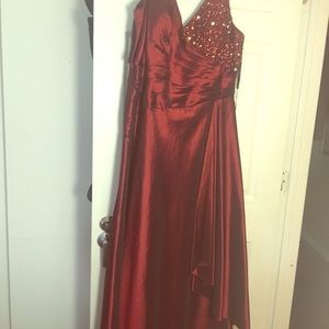Wine red gown with sequins on one side and back